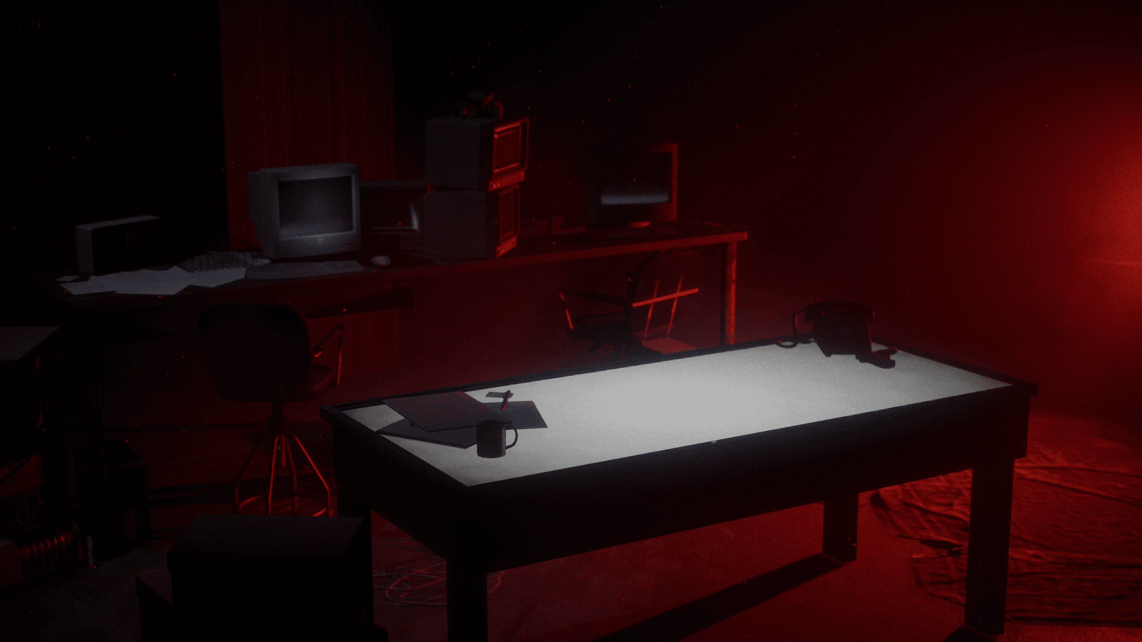 Room with computer and desk